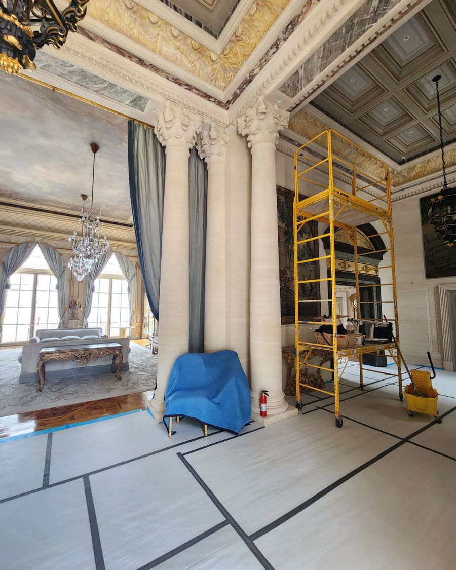 Interior of a Pellikal client's home with floors and furnishings covered and protected during installation